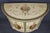 An exceptionally rare and visually breathtaking Adams-style painted demilune commode, this museum-quality piece represents...