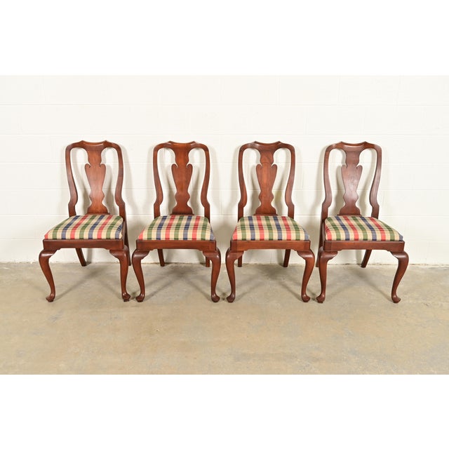 An outstanding set of four Queen Anne or Georgian style dining chairs By Henkel Harris USA, Circa 1980s Solid cherry wood...