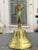 Beautiful and unusual vintage brass bell featuring an intricately detailed anthropomorphic figure inspired by ancient...