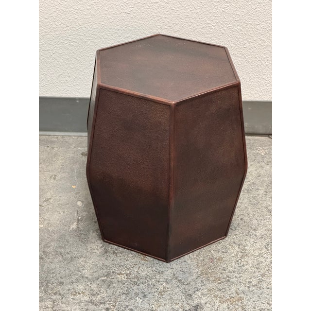 Design Plus Gallery presents a Hexagonal Embossed Leather Side Table. This piece has a six-sided form wrapped in pebbled...