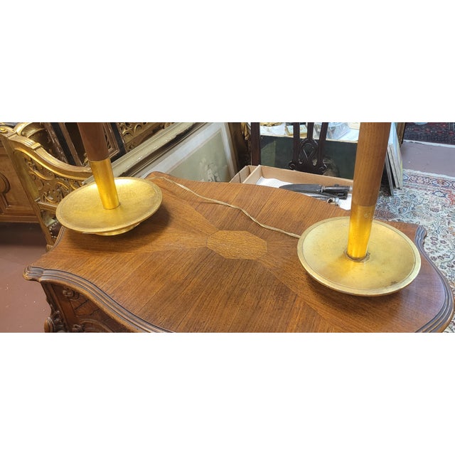 Cool pair of mid century modern table lamps in the Atomic style. Each features original shades, pull chains, double socket...