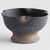 This footed bowl is hand thrown and formed by an artisans touch. But the real story is in the glaze. The dynamic texture...