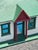 A Model Irish Cottage Charming and very well constructed doll house like cottage model. Likely early 20th C., wood paint...