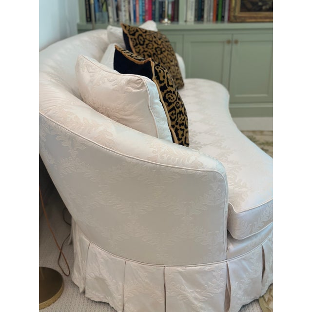 Gracefully curved and beautifully tailored, this exceptional vintage sofa has been thoughtfully reimagined with luxurious...