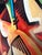 This item is a 1995 work titled The Protector by Rick Herold, executed as a bold abstract figural composition with strong...