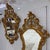 An exquisite pair of vintage mid-century Italian Rococo / Florentine-style wall mirrors. Crafted with dramatic openwork...