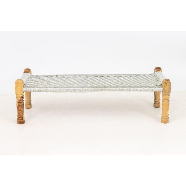 Contemporary Charpai Silvered Woven Rope and Turned Wood Bench. 18" H x 60.25" W x 24.5" D. Provenance: From a One Central...