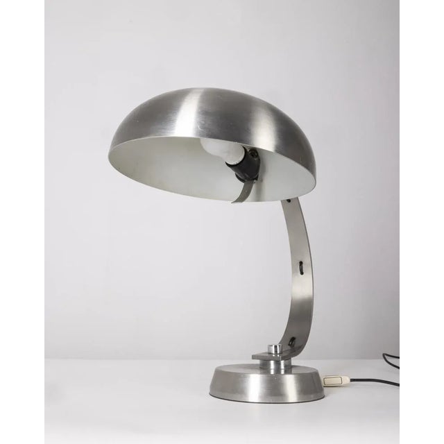 Ministerial table lamp entirely in chromed metal, adjustable lampshade, Italian design, 1970s. European Plug (up to...