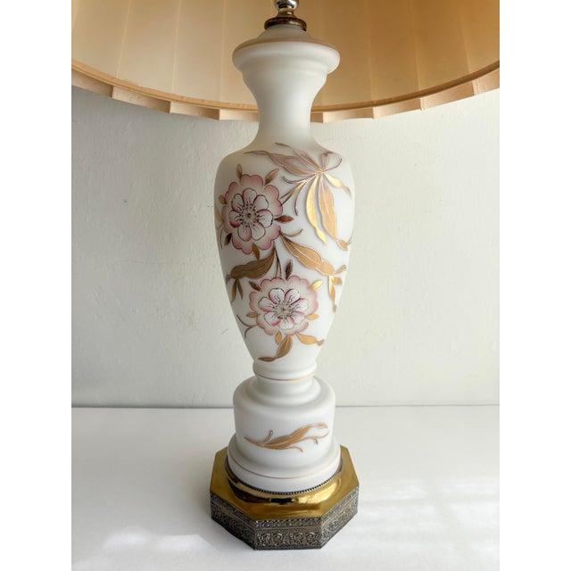 Vintage mid-century Bavarian table lamp Painted gold and pink floral decor on white milk glass base, resting on brass...