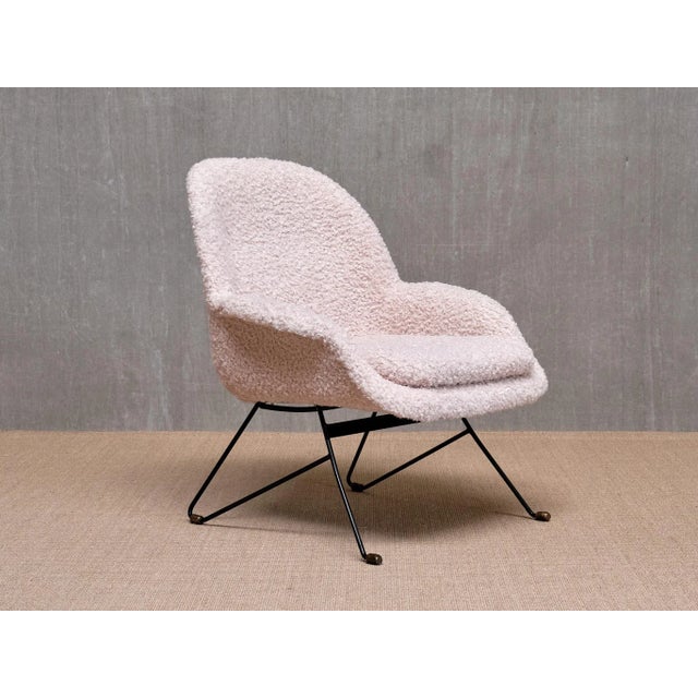 This rare armchair was produced in Italy during the 1950s, with its design attributed to Augusto Bozzi, who created...