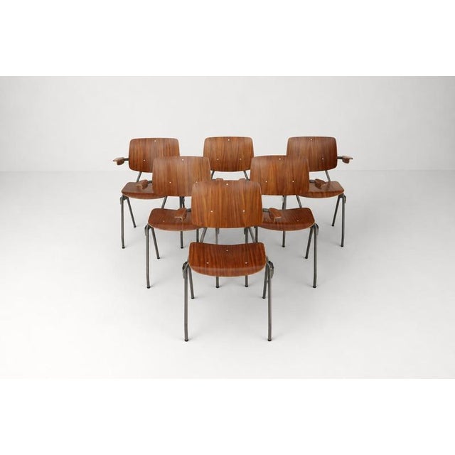 The Model 315 stacking chair, designed by Kho Liang Ie for Car Catwijk, represents a significant piece of mid-century...