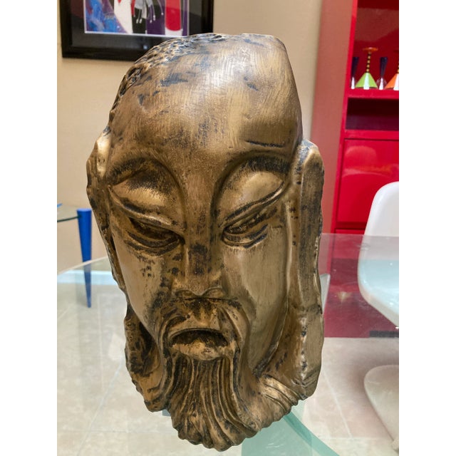 Fabulous gold male Asia bust head very unique and fun. The design is a little abstract from the mid century modern area.