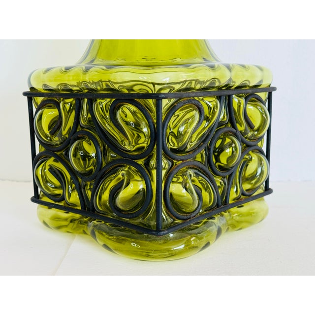 Vintage 1960s olive green glass and iron cases square vase. This large vase is handblown and the glass has a ribbed...