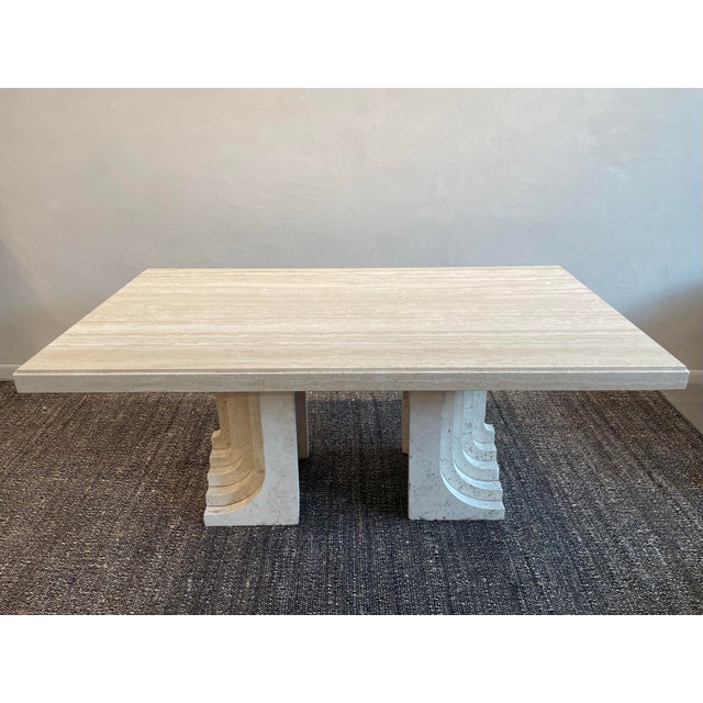 This striking vintage dining table is crafted from beautifully veined ivory-toned stone. Its substantial rectangular top...