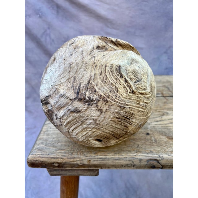 Unique hand-carved folk art-style wood gazing ball. A friend of bookshelves and coffee tables. A lovely garden accent. An...