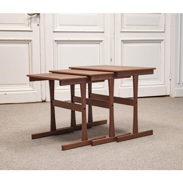 Elegant set of three nesting tables produced by Kristensen & Thomassen, Denmark, dating from the 1960s. The set is...