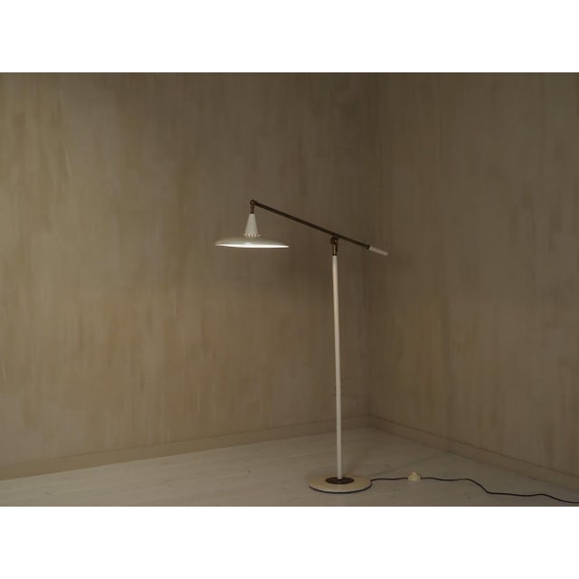 Italian mid century modern floor lamp Italy 1960's, metal and brass European Plug (up to 250V).The wiring of this item may...