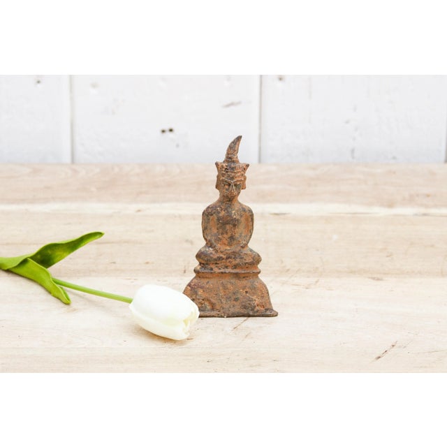 Discover the beauty of this miniature bronze Shan style Buddha amulet, adorned with a stunning aged patinated finish. This...