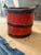 A charming 19th century berry bucket, hand crafted with wood staves bound by iron bands and finished in its original red...