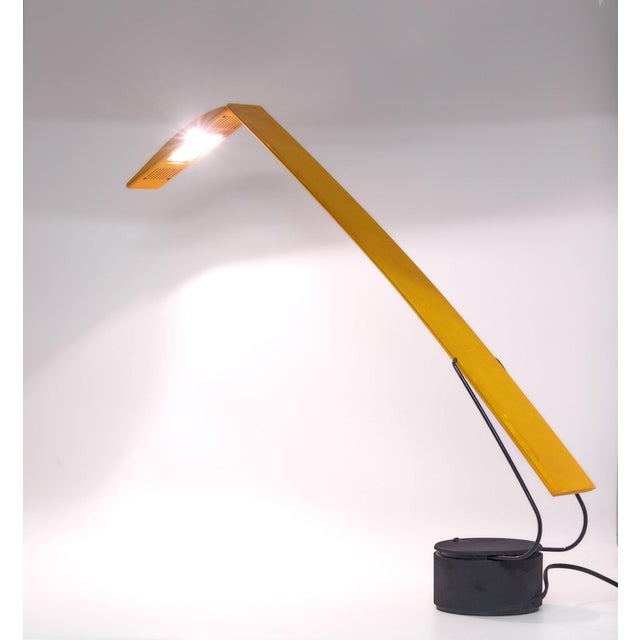 Postmodern "dove" yellow table lamp designed by mario barbaglia & marco colombo for paf studio - italy. Circa 1980. the...