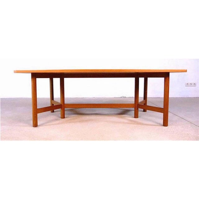 This large teak coffee table was manufactured by Rasmus Solberg in Norway during the 1960s. The piece is made from solid...