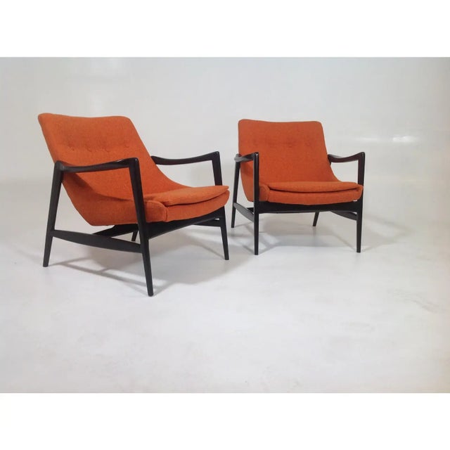 Mid-Century Modern lounge chairs in the style of Ib Kofod-Larsen. Stunning lounge chairs, mid-century style at its finest!...