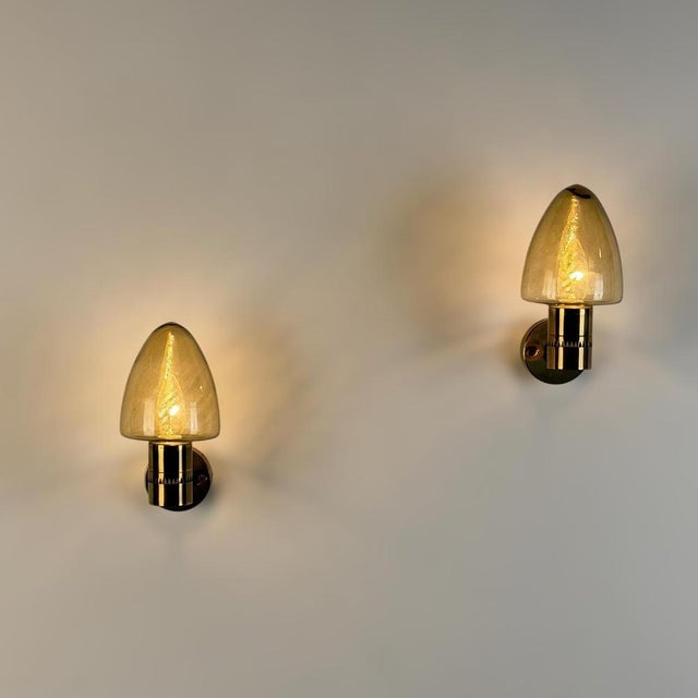 An elegant and highly decorative pair of wall sconces, model v-220, designed by hans-agne jakobsson and produced by ab...