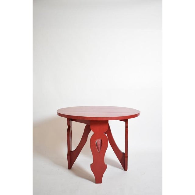 Burgundy red rustic round table, 1920s. Height: 74 cm - 29.13 in Diameter: 100 cm - 39.37 in