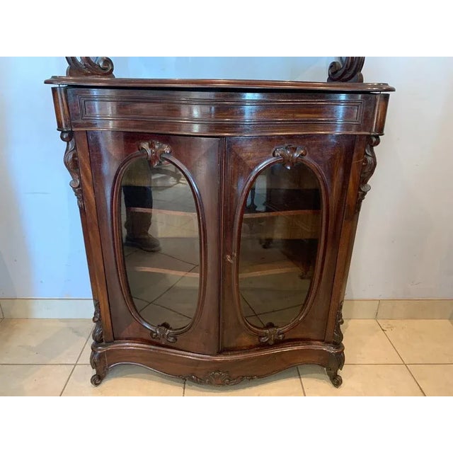 Louis philippe curved display cabinet in mahogany veneer on oak two oval glass doors and a drawer in the apron two curved...