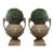 Pair of English Cast Iron Urn Planters With Figural Reliefs For Sale