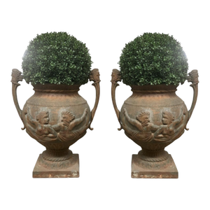 Pair of English Cast Iron Urn Planters With Figural Reliefs