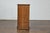 A French Turn of the Century walnut small cabinet from circa 1900 with grey variegated marble top, single drawer over...