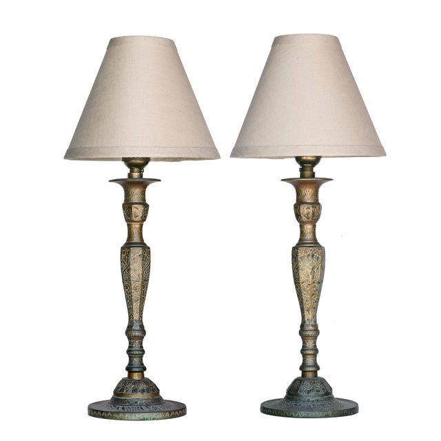 Pair of vintage solid brass Bohemian style engraved candlestick lamps unmarked. Solid brass candlesticks converted into...