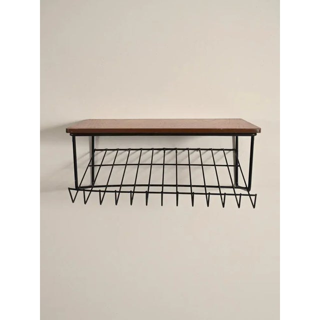 Bedside table / hanging console table in teak and metal. Consisting of a simple teak wood shelf with rounded corners and a...