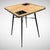 This table exemplifies Jacques Adnet's signature style, characterized by the combination of metal and saddle leather....