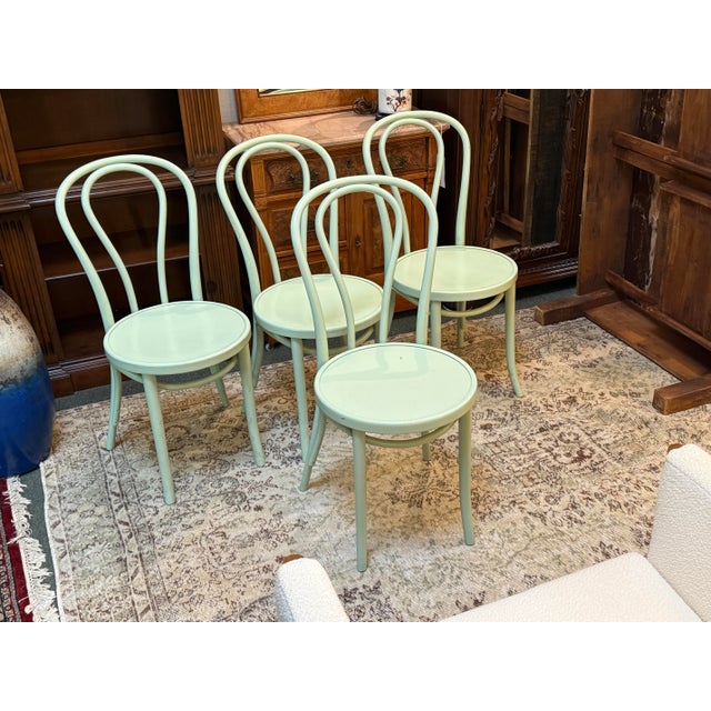 Design Plus Gallery presents a Set of Four Bentwood Dining Chairs in Mint Green. These chairs are reproductions of iconic...