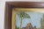 Antique wood framed embroidery with gold. The frame is thick and heavy and the glass has bubbles and some scratches in it,...