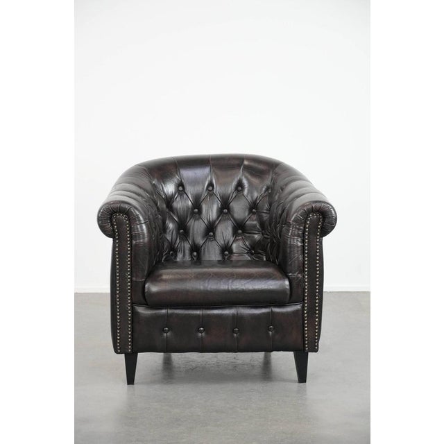 Chesterfield Club Chair in Dark Cowhide Leather, in None conditions. Designed 1990 to 1999