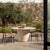 Simple and impactful, this marble outdoor dining table features a pedestal base with a monolithic effect. The base comes...