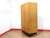 A gorgeous armoire by renowned British furniture maker G Plan, this vintage blonde double wardrobe perfectly embodies the...