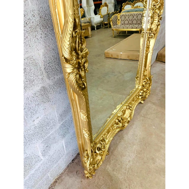 This vintage French style Baroque wall mirror is a bold statement piece designed to bring glamour, scale, and elegance to...