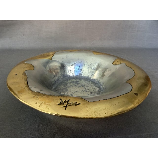 David Marshall, fruit bowl, centerpiece, vintage, made of bronze and aluminum, total dimensions of 5.5 x 25.3 cm. This...