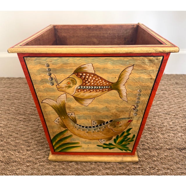 Vintage handpainted waste bin or log holder. Wood with flared sides. Hand painted scene of fish on each side.