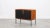 Sideboard of contemporary German artist Johannes Hock. The front of the doors is made of black HPL, the body is made of...
