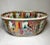 Produced mid century circa 1940s. Beautiful Famille Rose Cachepot. featuring multi garden scenes. Hand painted.