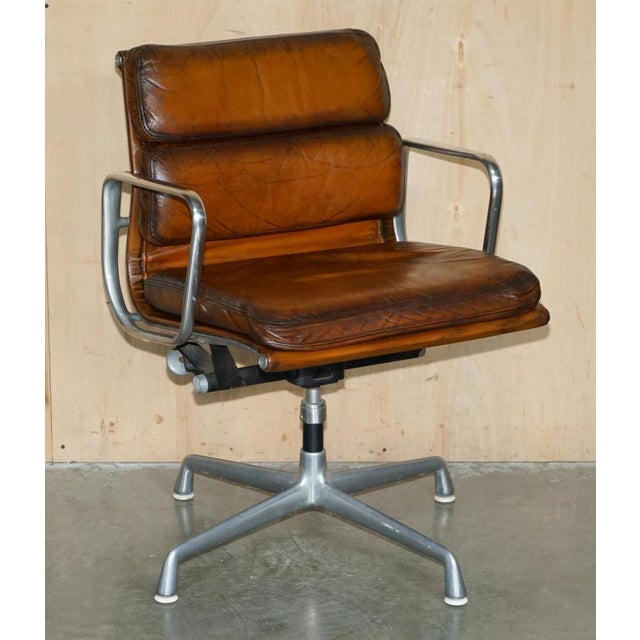 Super comfortable, original herman miller 1977 hand dyed cigar brown leather soft pad captains chairs which are model...