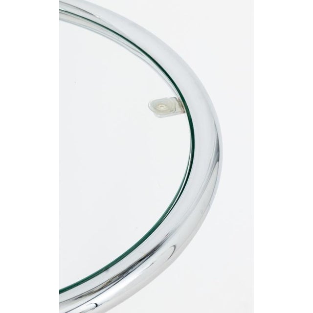Mid Century Modern Eileen Gray Style Chrome and Glass Circular Side Table. 22.25" H x 17.5" Diameter. Provenance:...