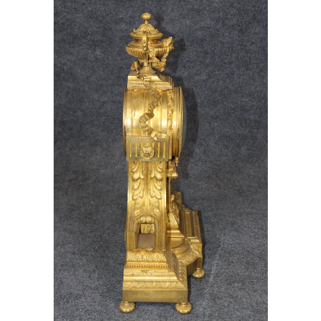 This magnificent French gilt-bronze clock by Denière of Paris represents the exceptionally high standard of bronze...