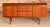 Mid Century teak sideboard by Meredew, circa 1960s. 2 cabinet sections and 3 drawers, including felt lined cutlery drawer...