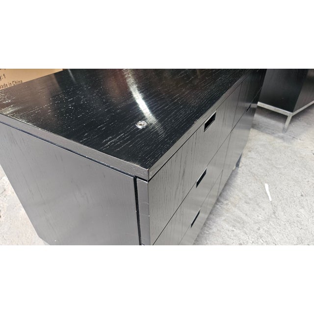 A timeless piece from modernist icon Florence Knoll, this 2-position credenza combines elegant form with practical...